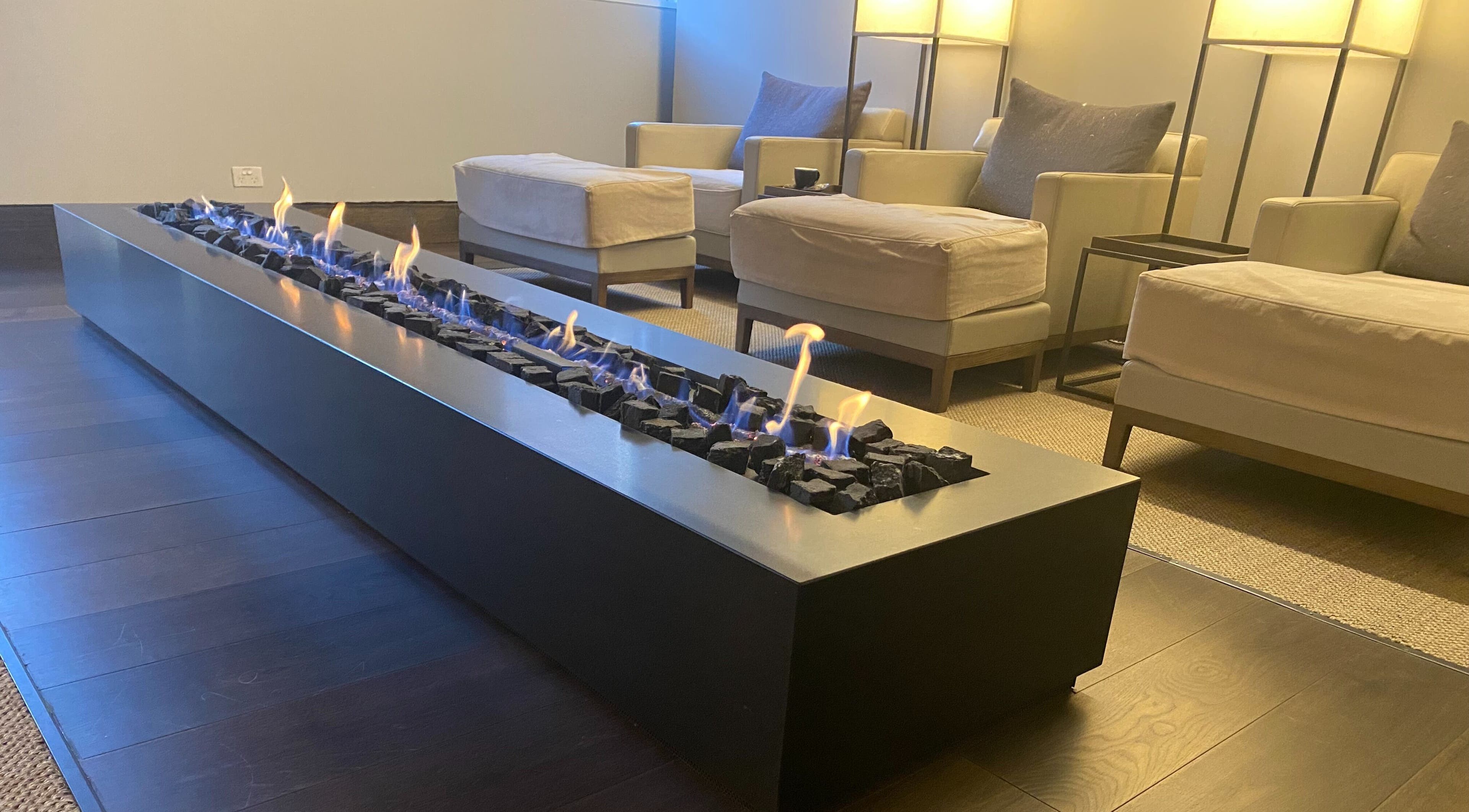 Elegant lounge with modern fireplace at Hale Spa, Barton, Australian Capital Territory, AU.