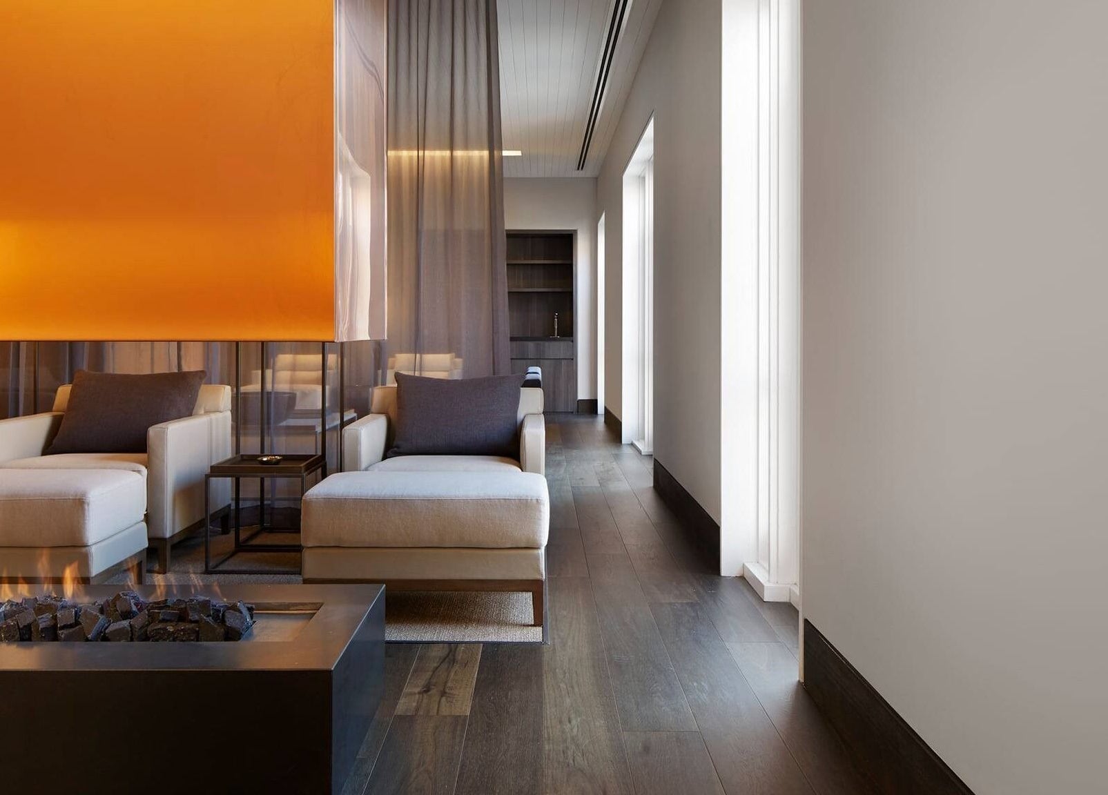 Luxurious seating at Hale Spa, Barton, Australian Capital Territory, AU with plush chairs and modern fireplace.