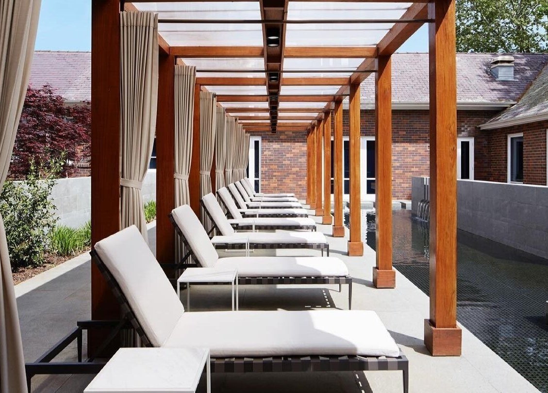 Elegant sun loungers by the pool at Hale Spa, Barton, Australian Capital Territory, AU.