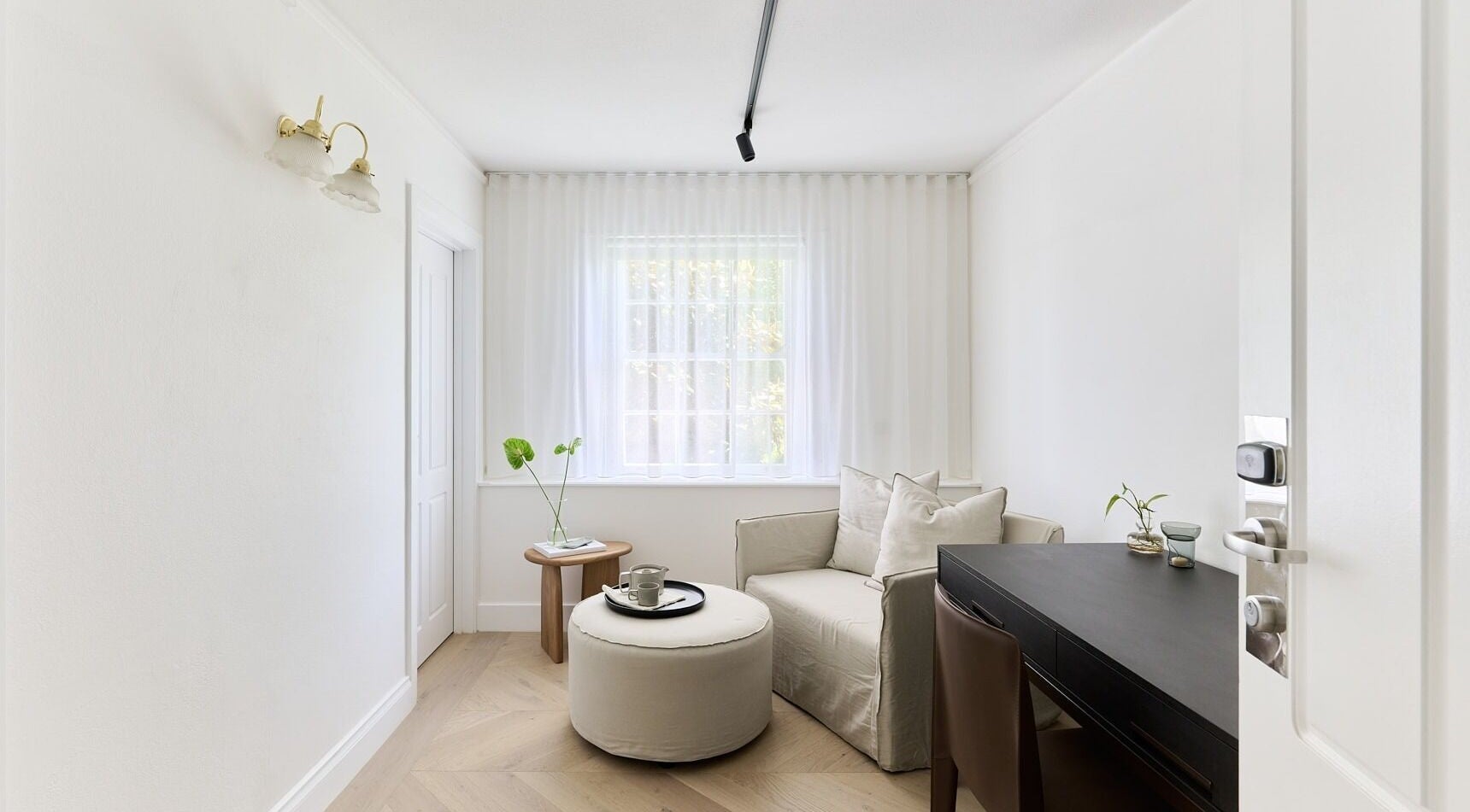 A tranquil room at Hale Aesthetics, Barton, Australian Capital Territory, AU, featuring cozy seating and natural light.