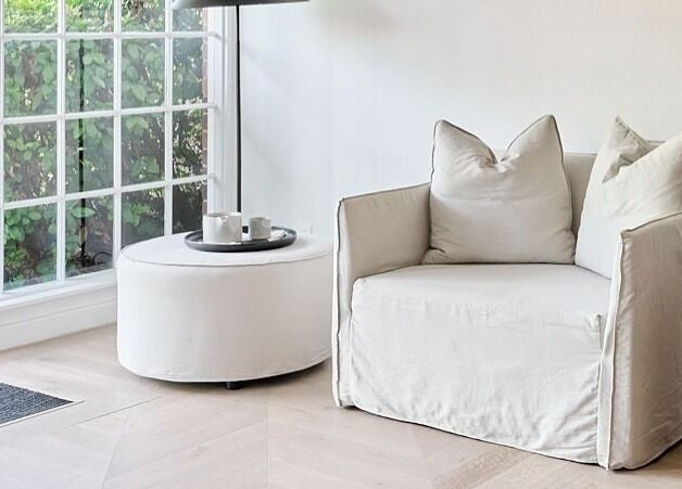 Elegant lounge area at Hale Aesthetics in Barton, Australian Capital Territory, AU with natural light and plush seating.