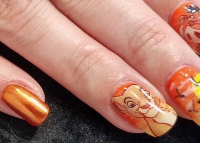 Stylish lion-themed nail art at Sarah Jane's Nails & Lashes, Southend-on-sea, England, GB.