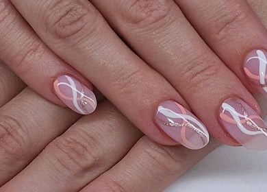 Intricate nail art with pink and white swirls at Sarah Jane's Nails & Lashes, Southend-on-sea, England, GB.