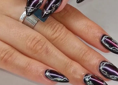 Chic cat-eye nail design at Sarah Jane's Nails & Lashes, Southend-on-sea, England, GB.
