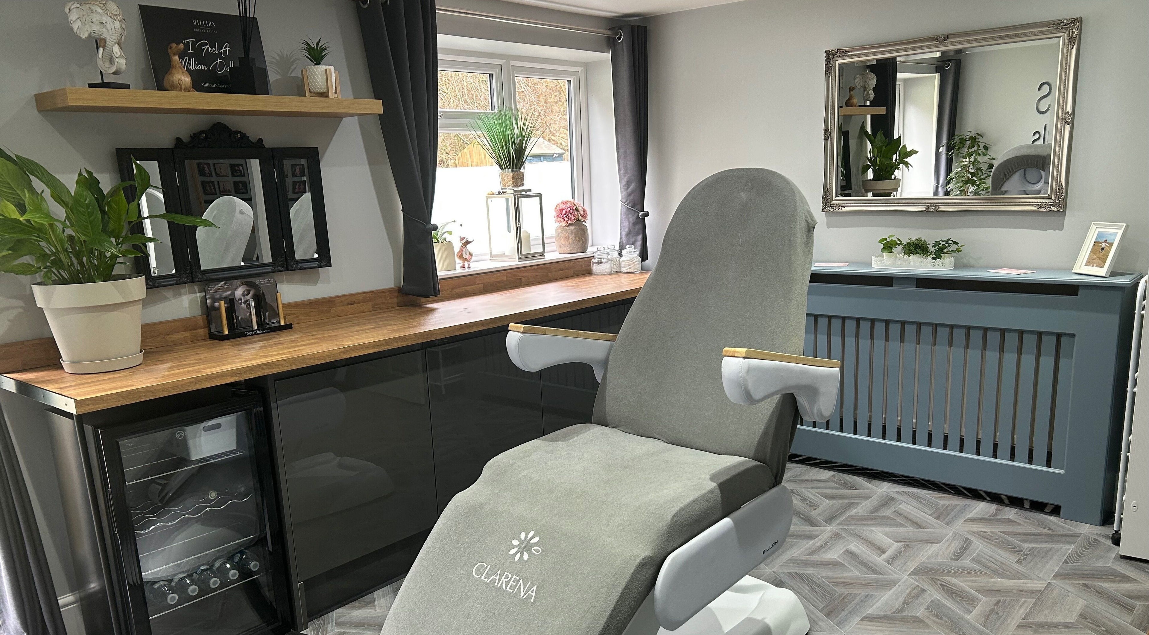 Luxurious treatment room at Aesthetics by Beauty Essentials, Halesowen, England, GB, featuring modern decor.