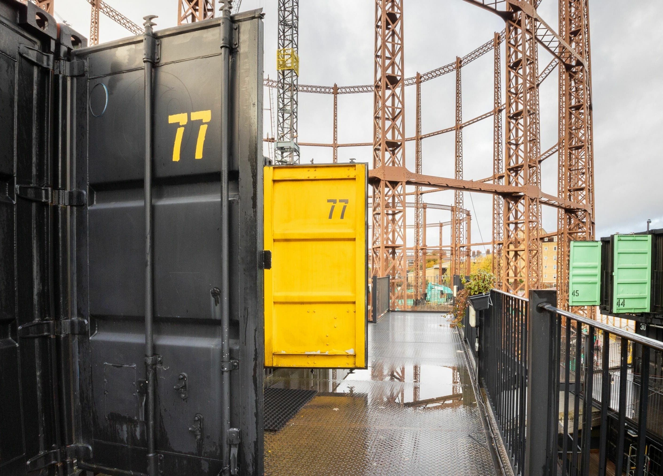 Unique industrial space at Sawyer, London, England, GB, with vibrant container setup making a striking statement.
