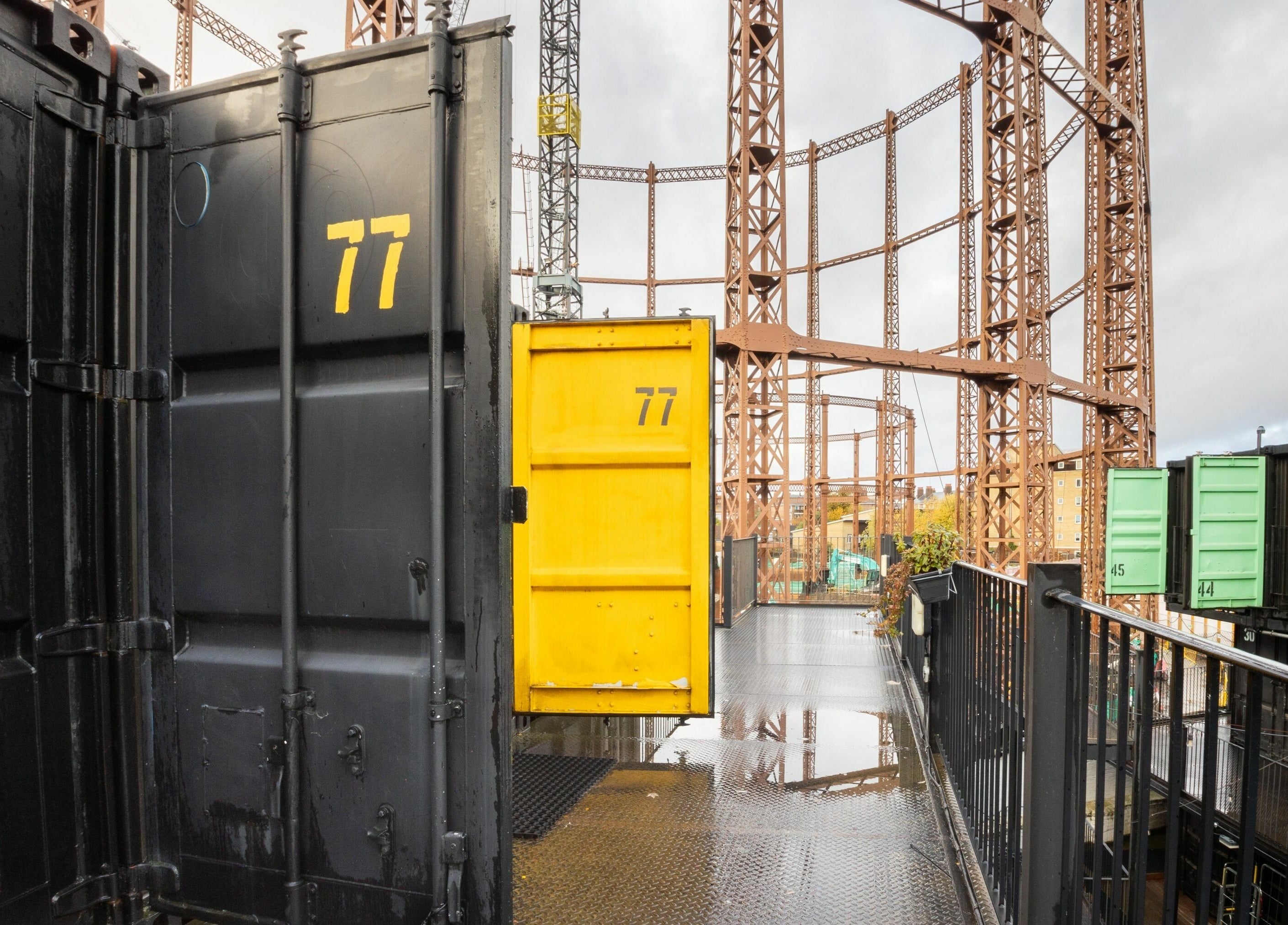 Unique industrial space at Sawyer, London, England, GB, with vibrant container setup making a striking statement.