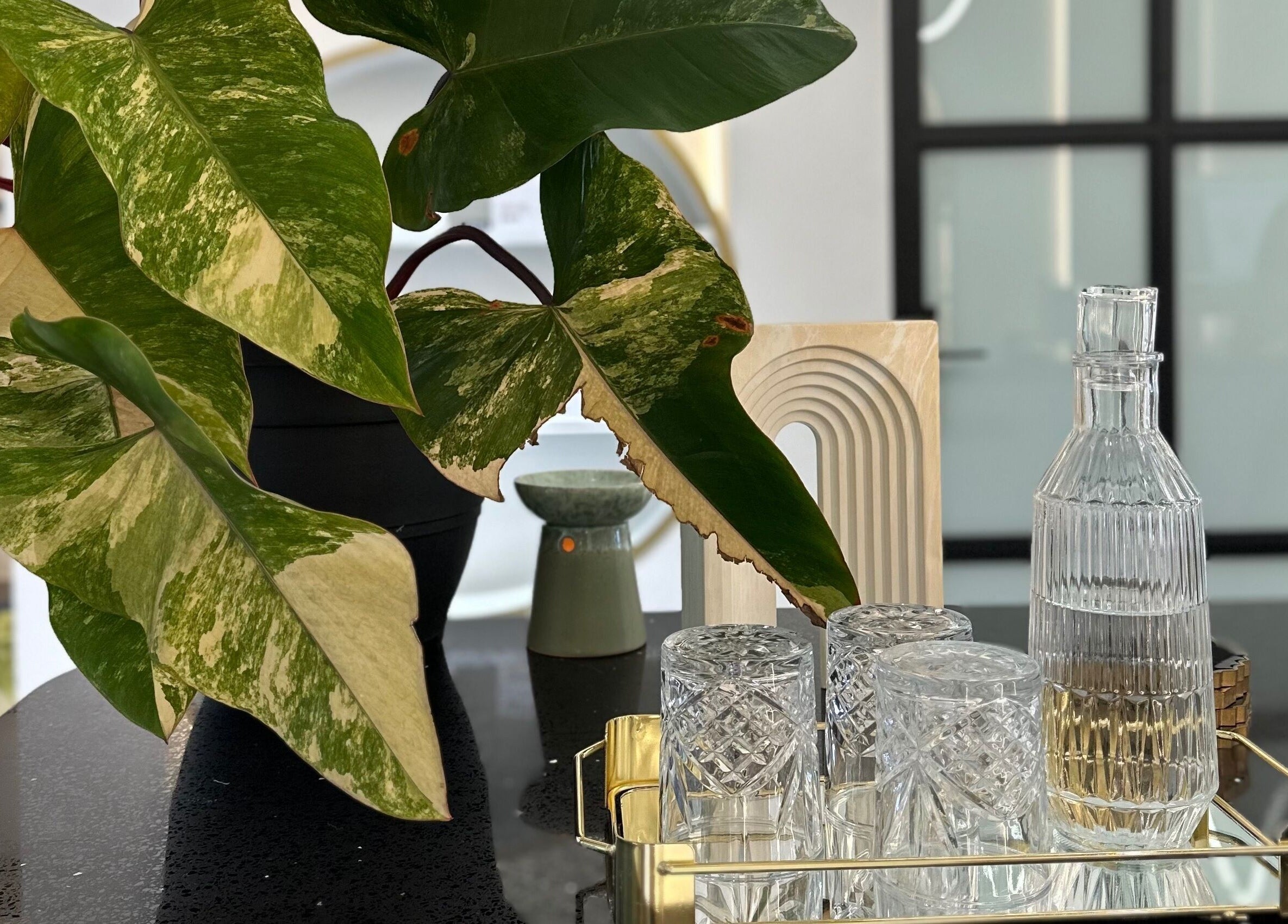 Stylish plant decor and glass set at Browserie, Petaling Jaya, Selangor, MY, offering a serene ambiance.