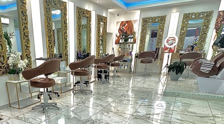 Elegant interior of VIP Hair & Beauty Salon in Bromsgrove, England, GB with ornate mirrors and plush seating.