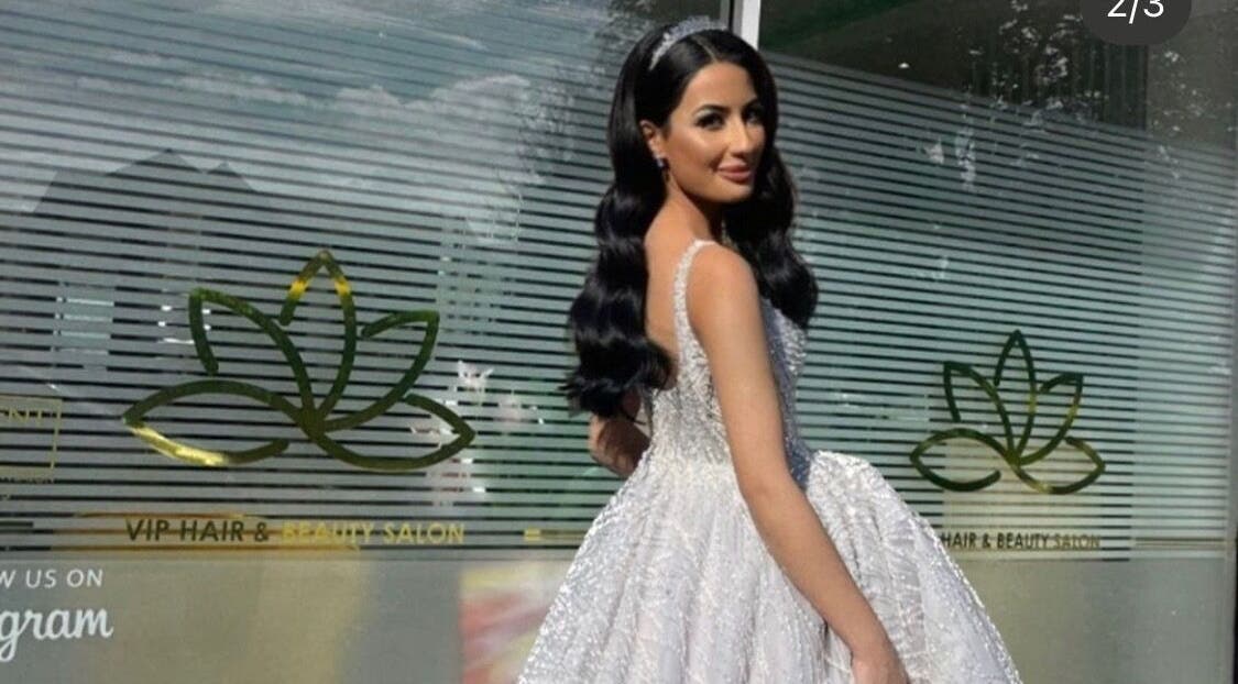 Bride with elegant hairstyle outside VIP Hair & Beauty Salon, Bromsgrove, England, GB.