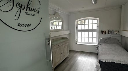 Cozy and elegant treatment room at Sophia’s Beauty Room, Kinsale, County Cork, IE with a serene atmosphere.