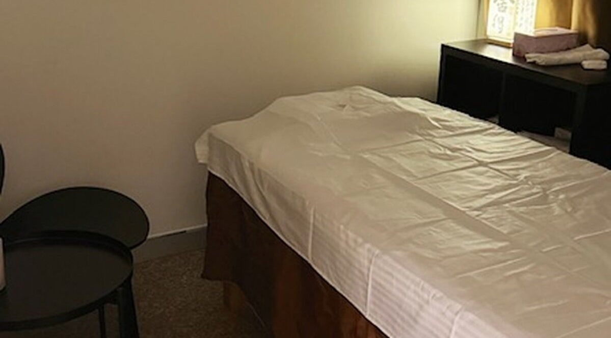 Calming therapy room at Japanese Aromatherapy, Haymarket, New South Wales, AU, with a massage table and soft lighting.
