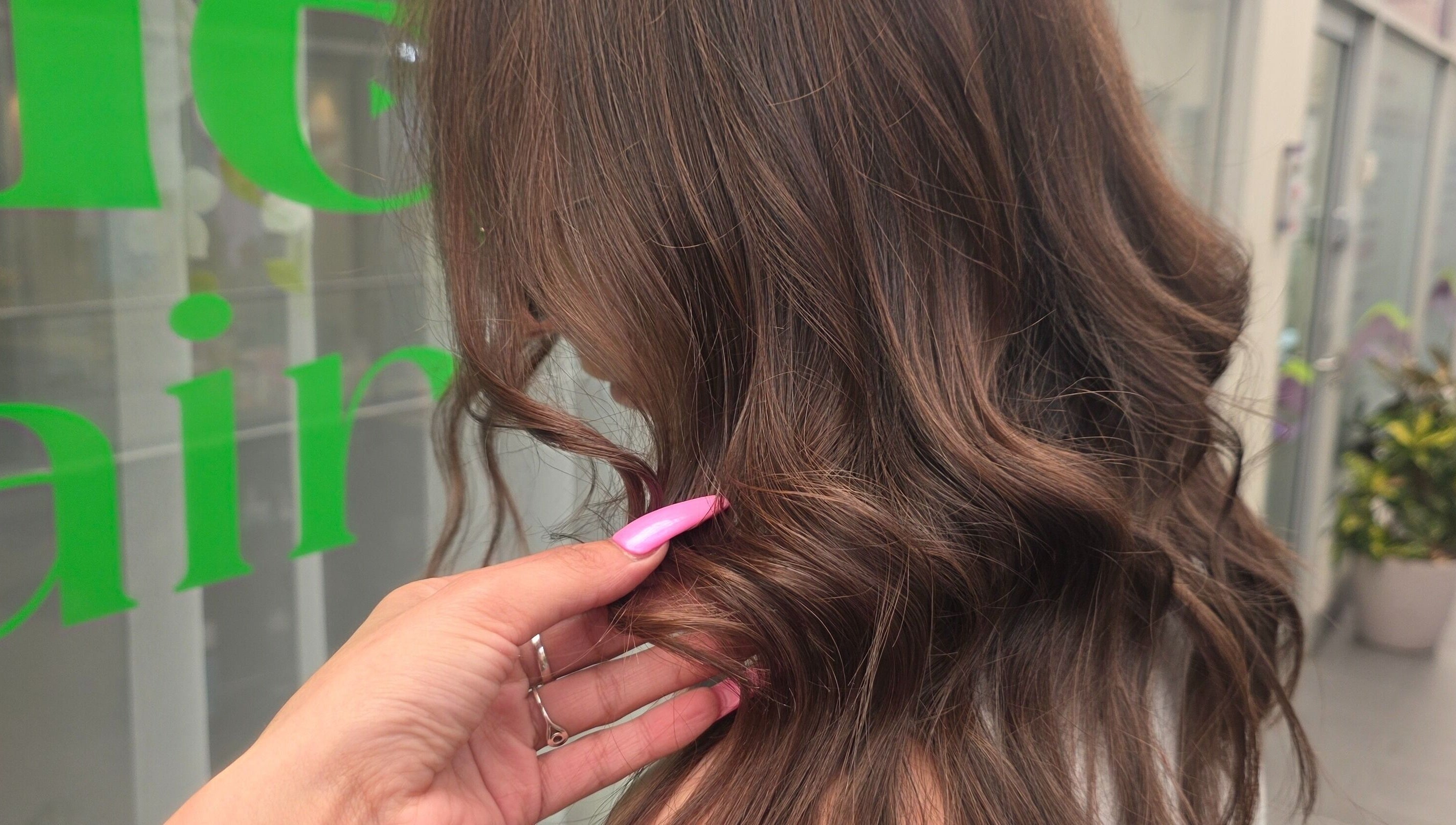 Stylish wavy hair captured at Mane Obsession, Sutherland, New South Wales, AU, showcasing professional styling.