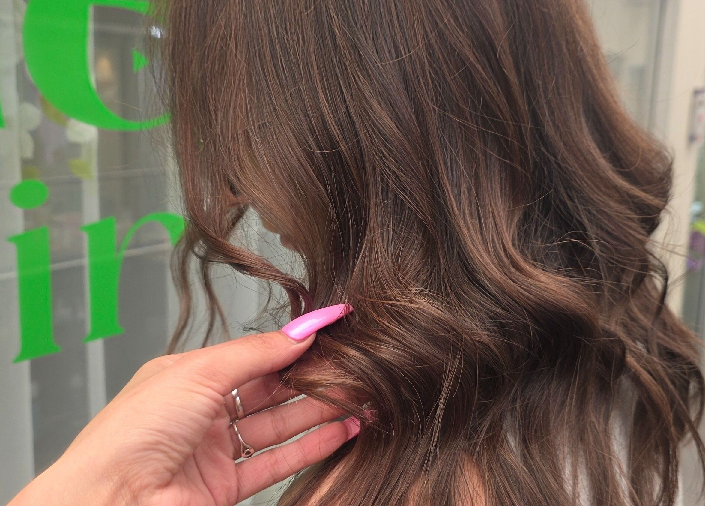 Stylish wavy hair captured at Mane Obsession, Sutherland, New South Wales, AU, showcasing professional styling.