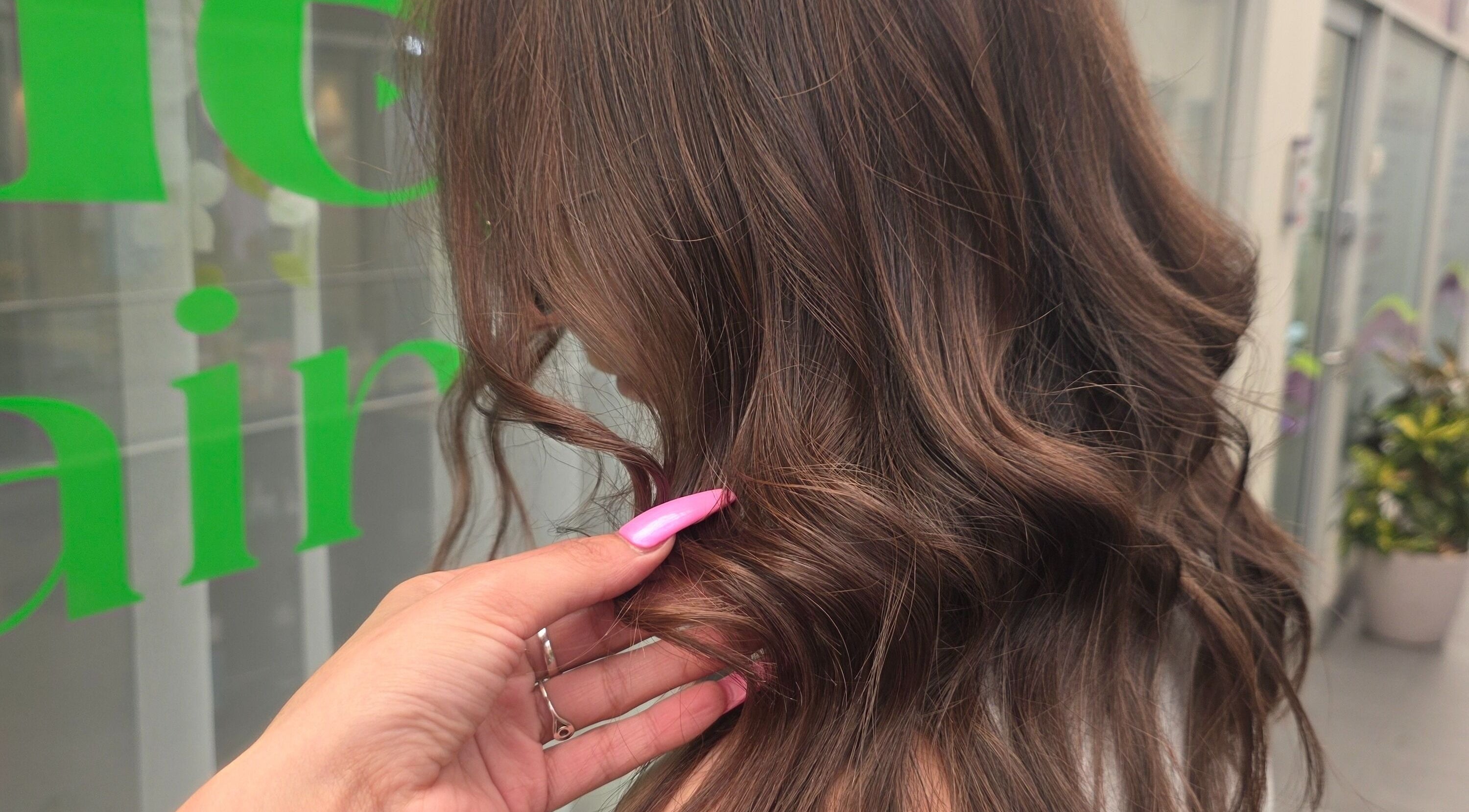 Stylish wavy hair captured at Mane Obsession, Sutherland, New South Wales, AU, showcasing professional styling.