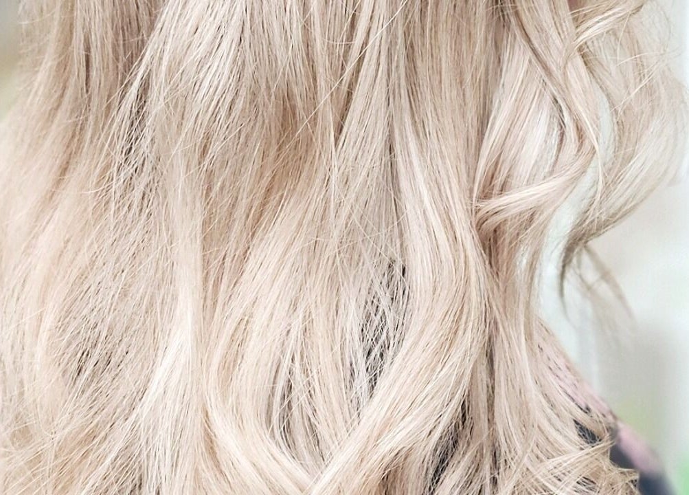 Elegant blonde waves styled at Mane Obsession, Sutherland, New South Wales, AU for a stunning look.