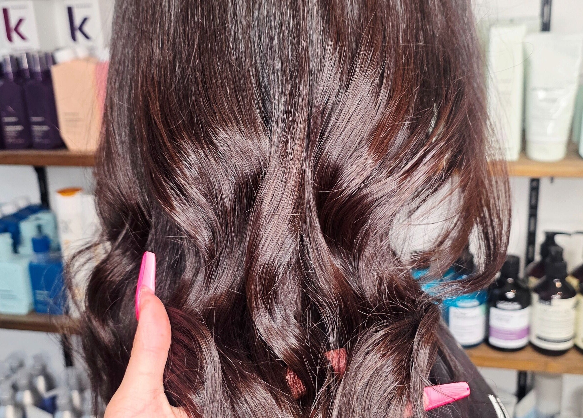 Shiny brown curls styled at Mane Obsession in Sutherland, New South Wales, AU.