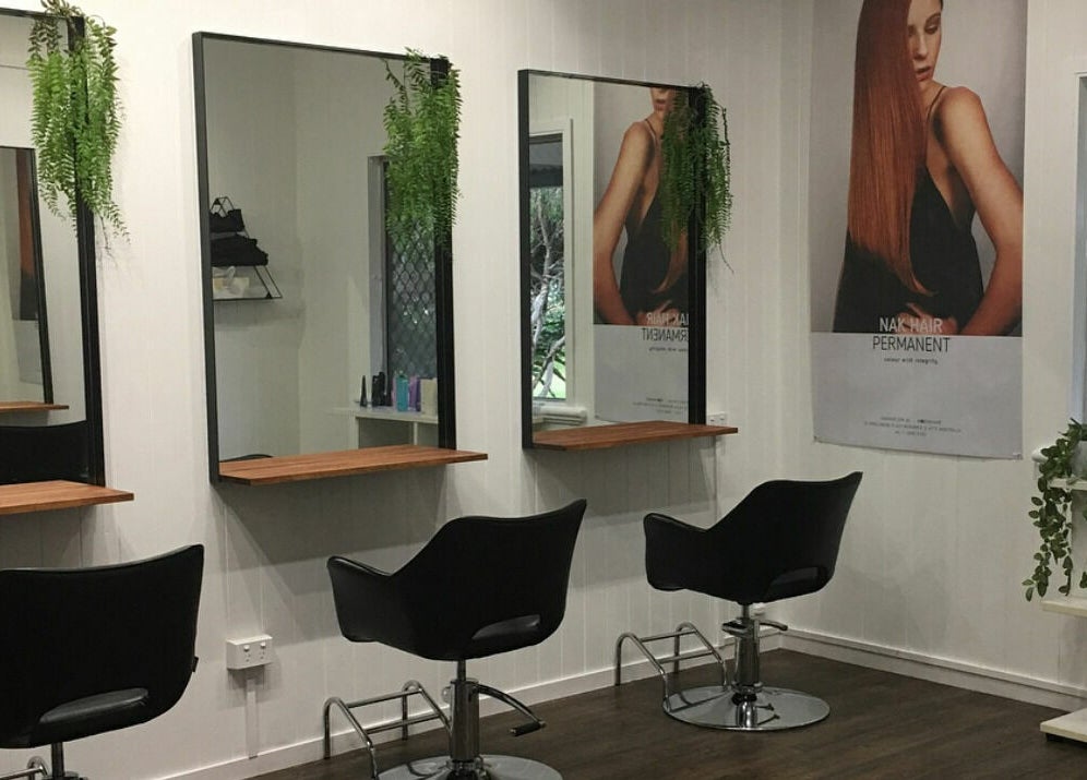 Modern salon chairs and mirrors at Maleny Hair and Beauty in Maleny, Queensland, AU.