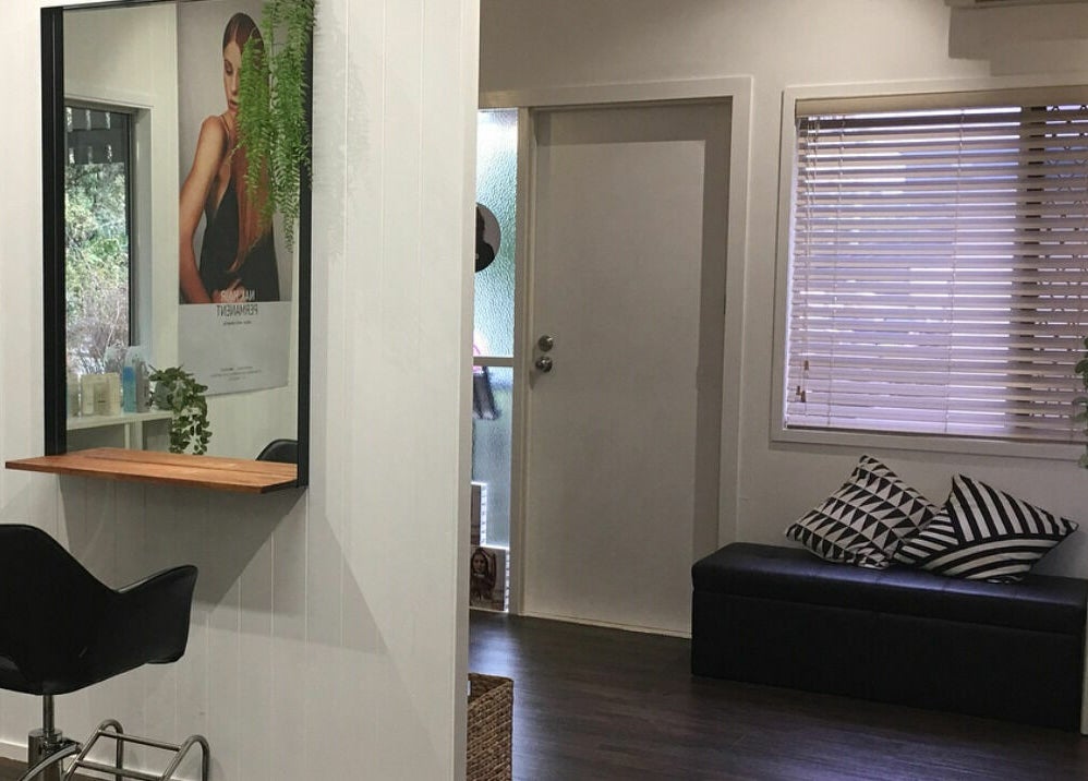 Stylish hairdresser station at Maleny Hair and Beauty, Maleny, Queensland, AU with chic decor and mirrors.