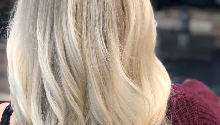 Blonde hair styled elegantly at Brian @ Twelve Stones Salon, Fresno, California, US.