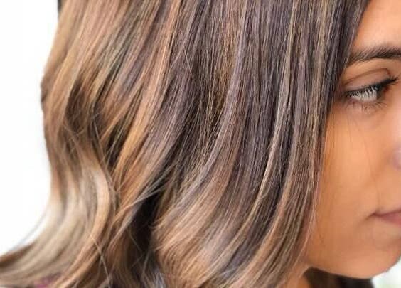 Stylish brown highlights at Brian @ Twelve Stones Salon, Fresno, California, US.