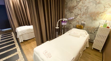 Tranquil spa room at Hera Beaute Spa in Nilai, Negeri Sembilan, MY with massage beds and soft lighting.