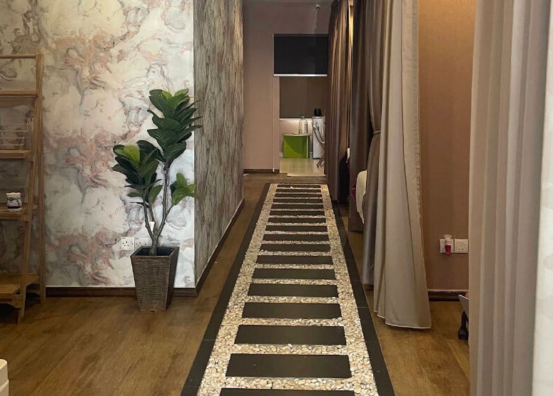 Tranquil walkway at Hera Beaute Spa, Nilai, Negeri Sembilan, MY with elegant decor and calming ambiance.