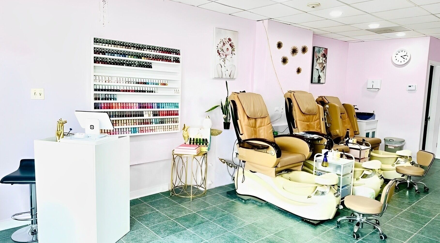 GMM Nails venue with pedicure chairs and nail polish, Highland Park, Illinois, US. Elegant and inviting salon space.