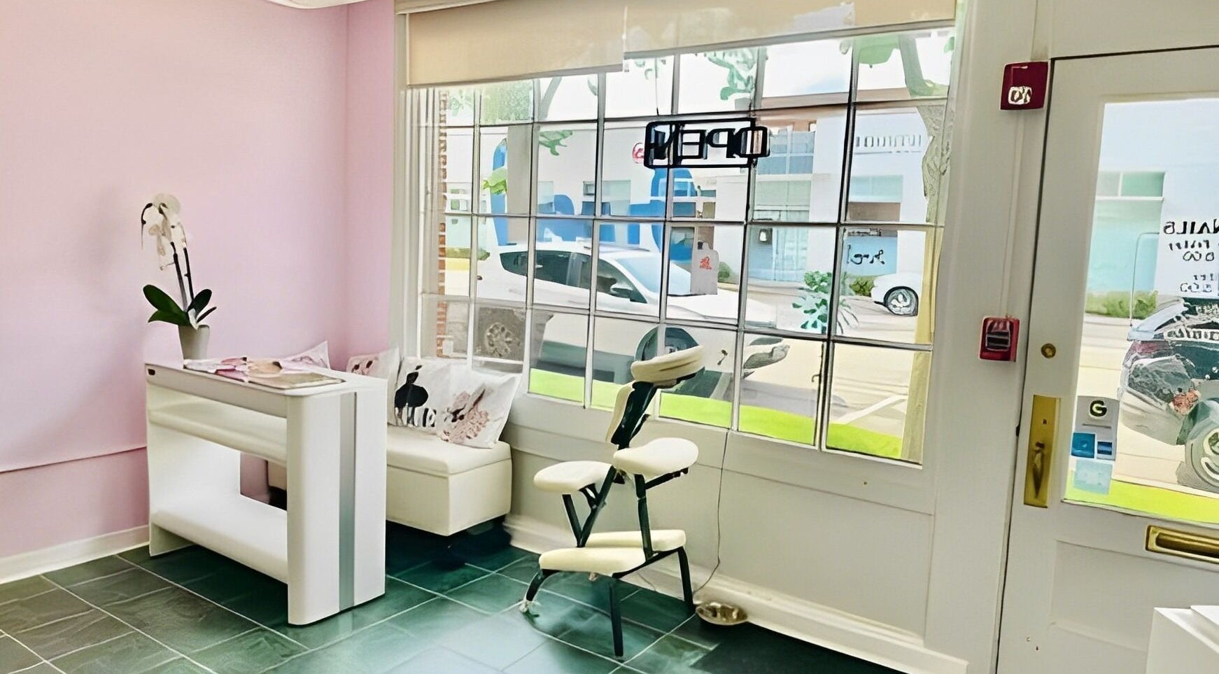Bright and inviting interior of GMM Nails in Highland Park, Illinois, US, showcasing a tranquil seating area.