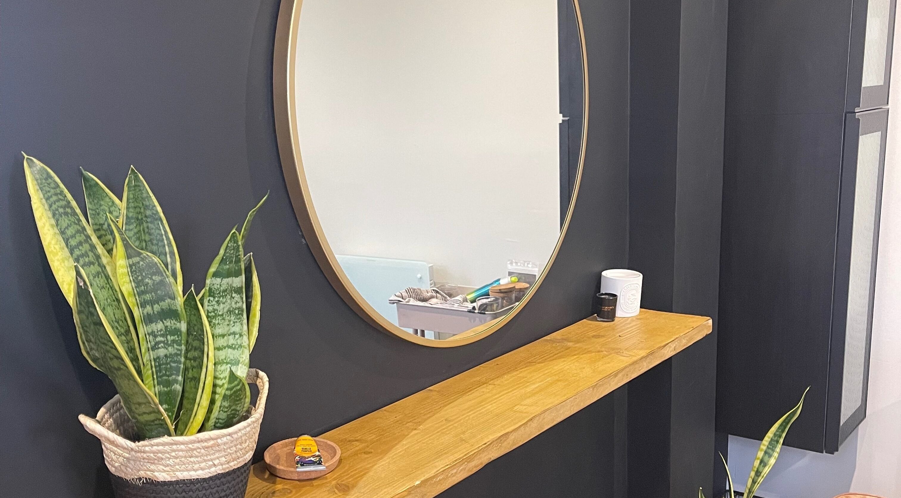 Stylish mirror and plants at Studio 39, Deal, England, GB, creating a serene beauty and wellness ambiance.