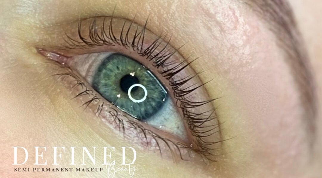 Close-up of a beautifully enhanced eye, showcasing Defined Beauty & SPMU's lash artistry in Swindon, England, GB.