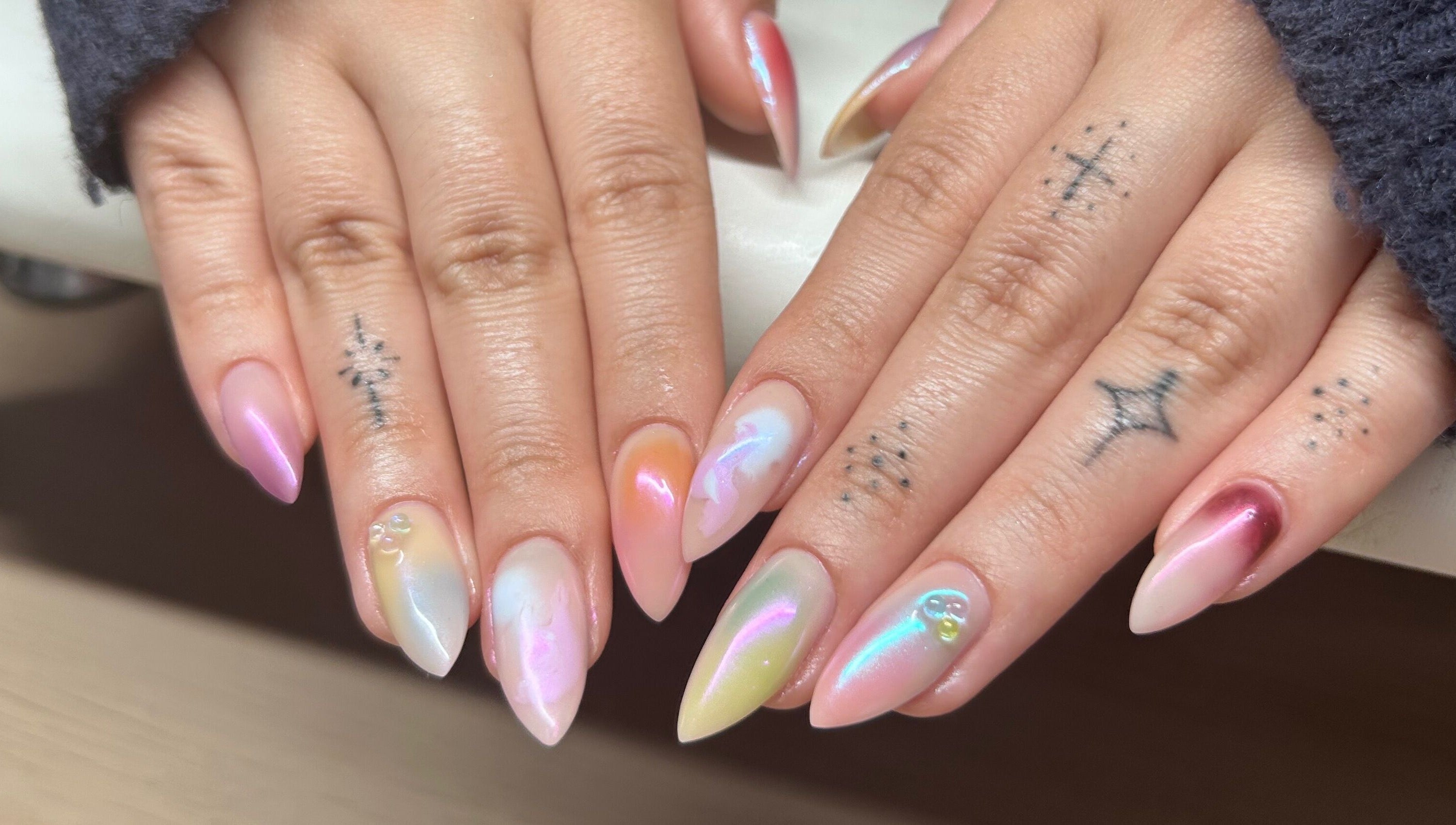 Stylish multicolor nail art at MANI Studio, Victoria, Victoria, AU showcases vibrant and elegant designs.