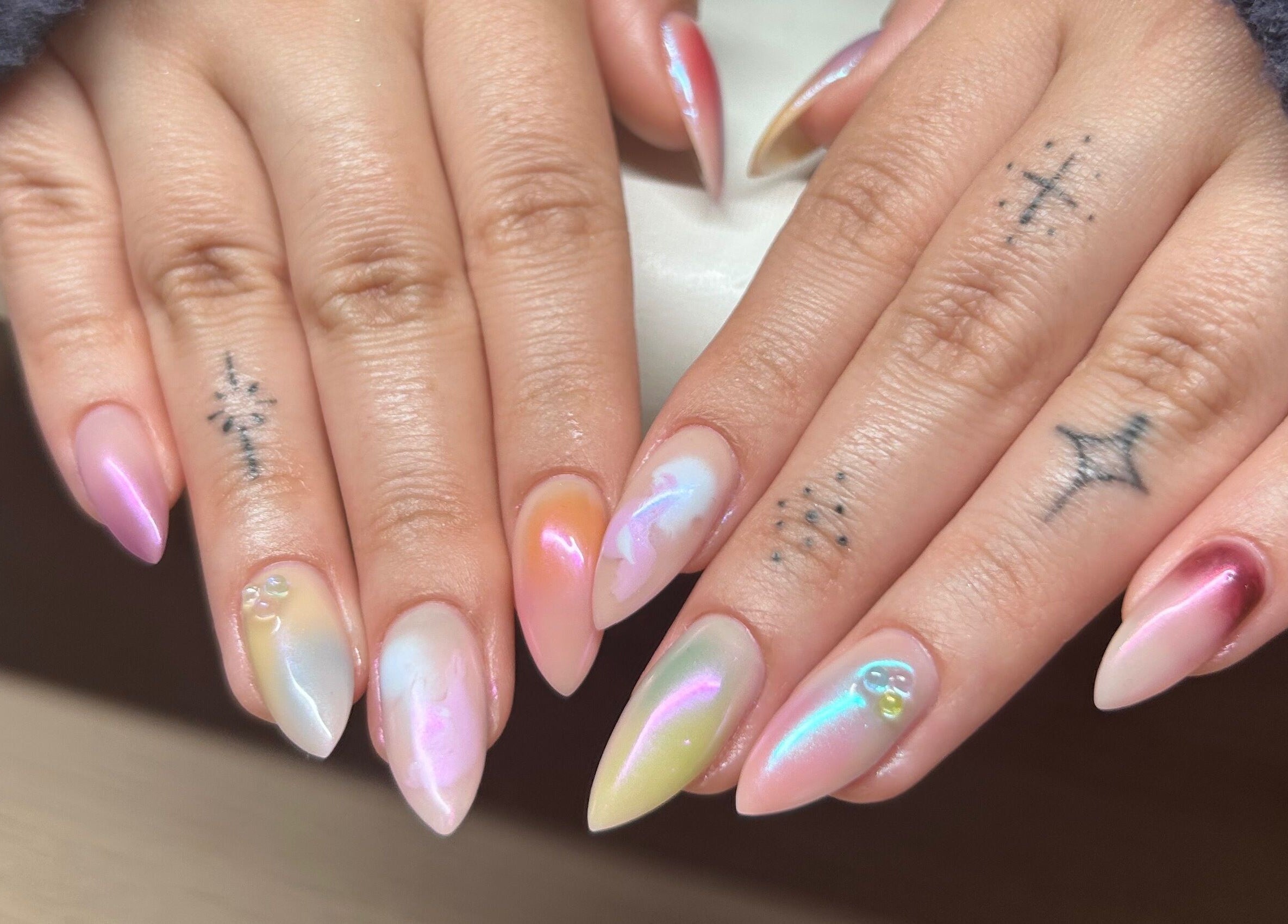 Stylish multicolor nail art at MANI Studio, Victoria, Victoria, AU showcases vibrant and elegant designs.