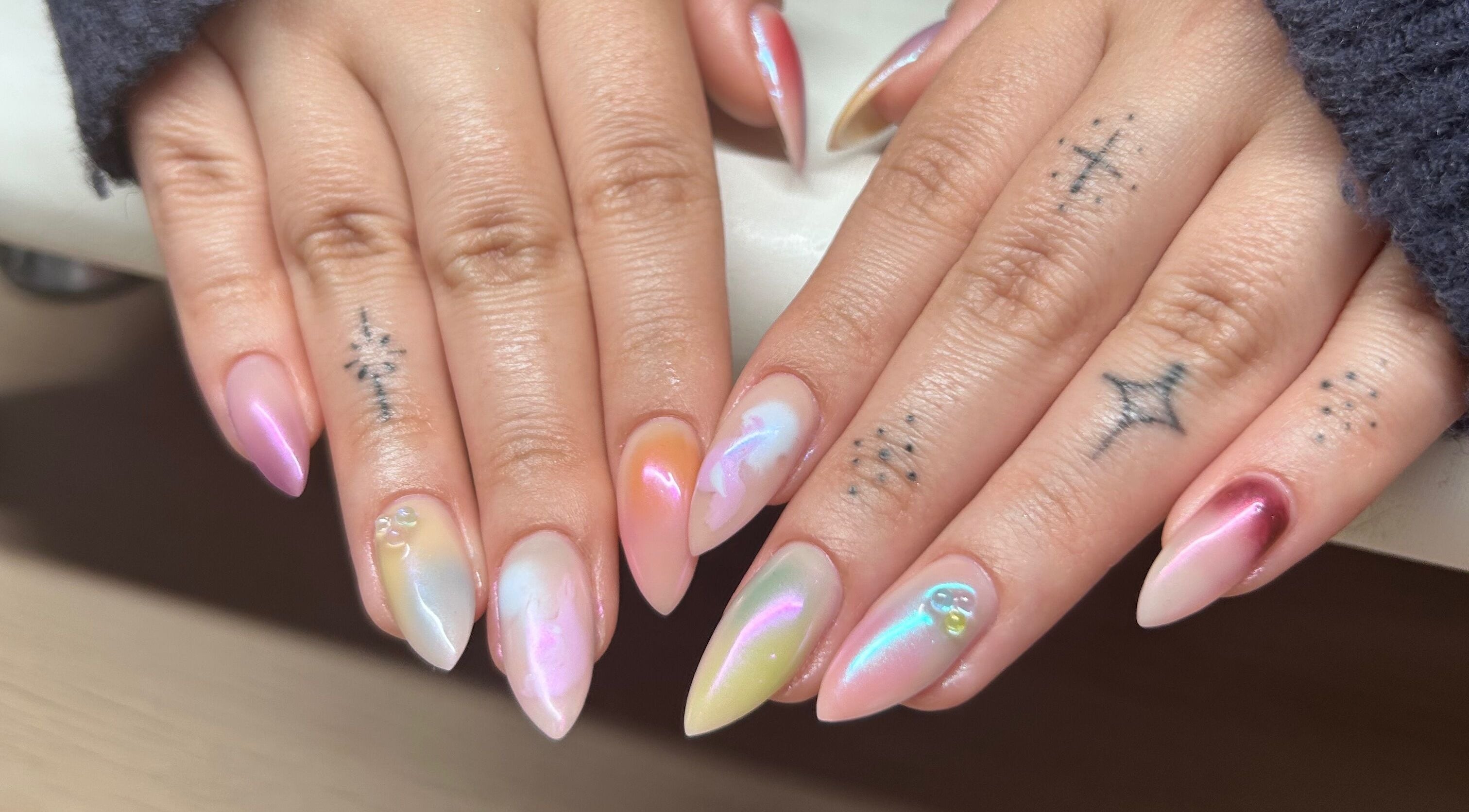 Stylish multicolor nail art at MANI Studio, Victoria, Victoria, AU showcases vibrant and elegant designs.