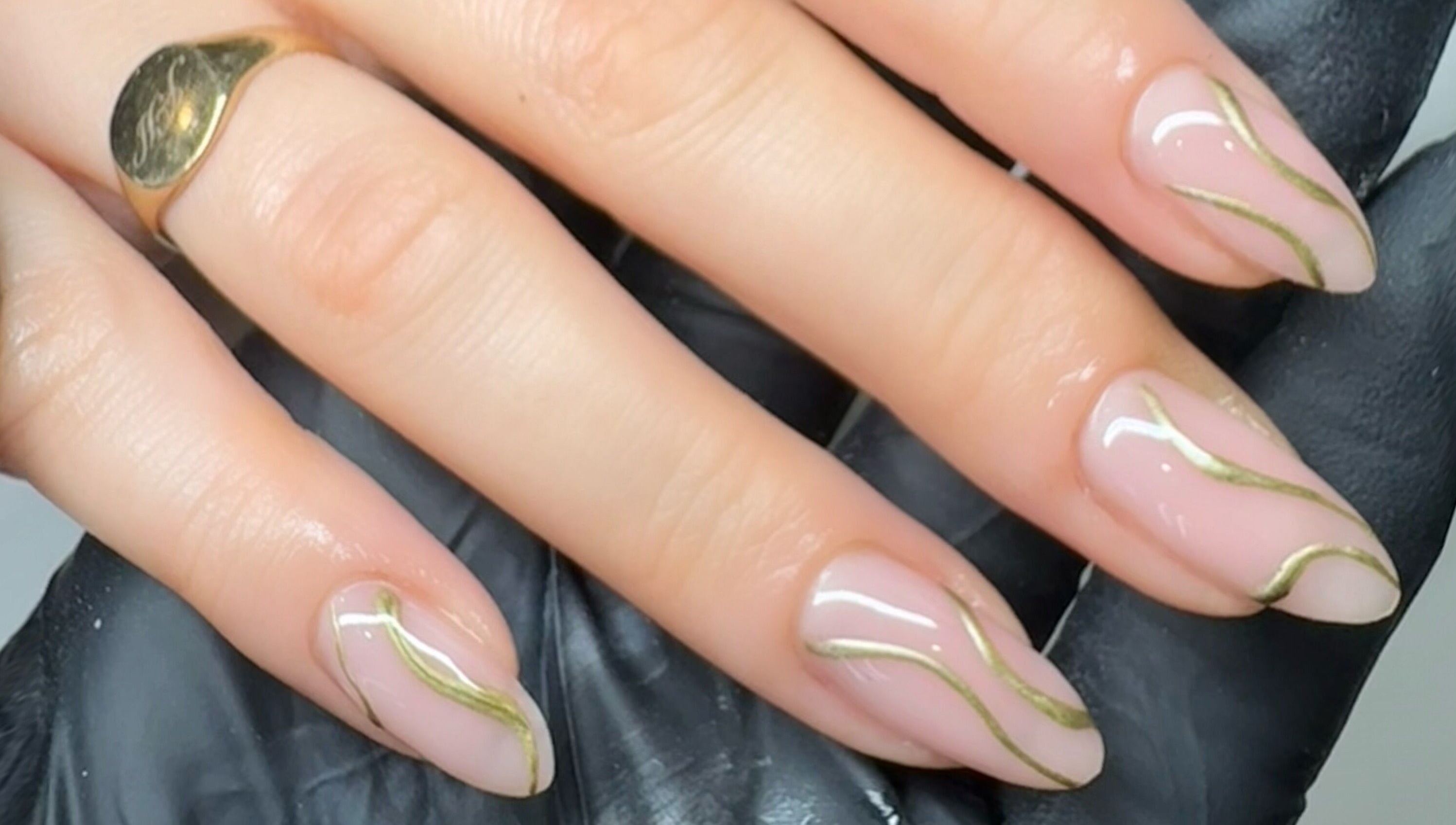 Stylish gold-accented nail art at Elizabeth Zara Nails & Beauty, Sutton Coldfield, England, GB.