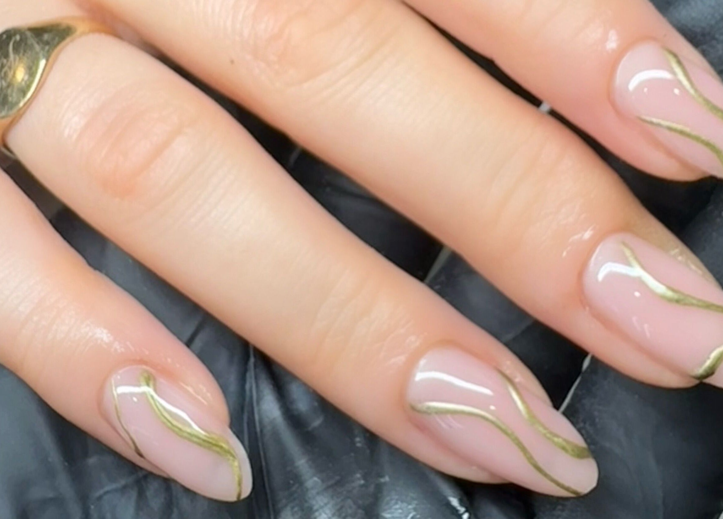 Stylish gold-accented nail art at Elizabeth Zara Nails & Beauty, Sutton Coldfield, England, GB.