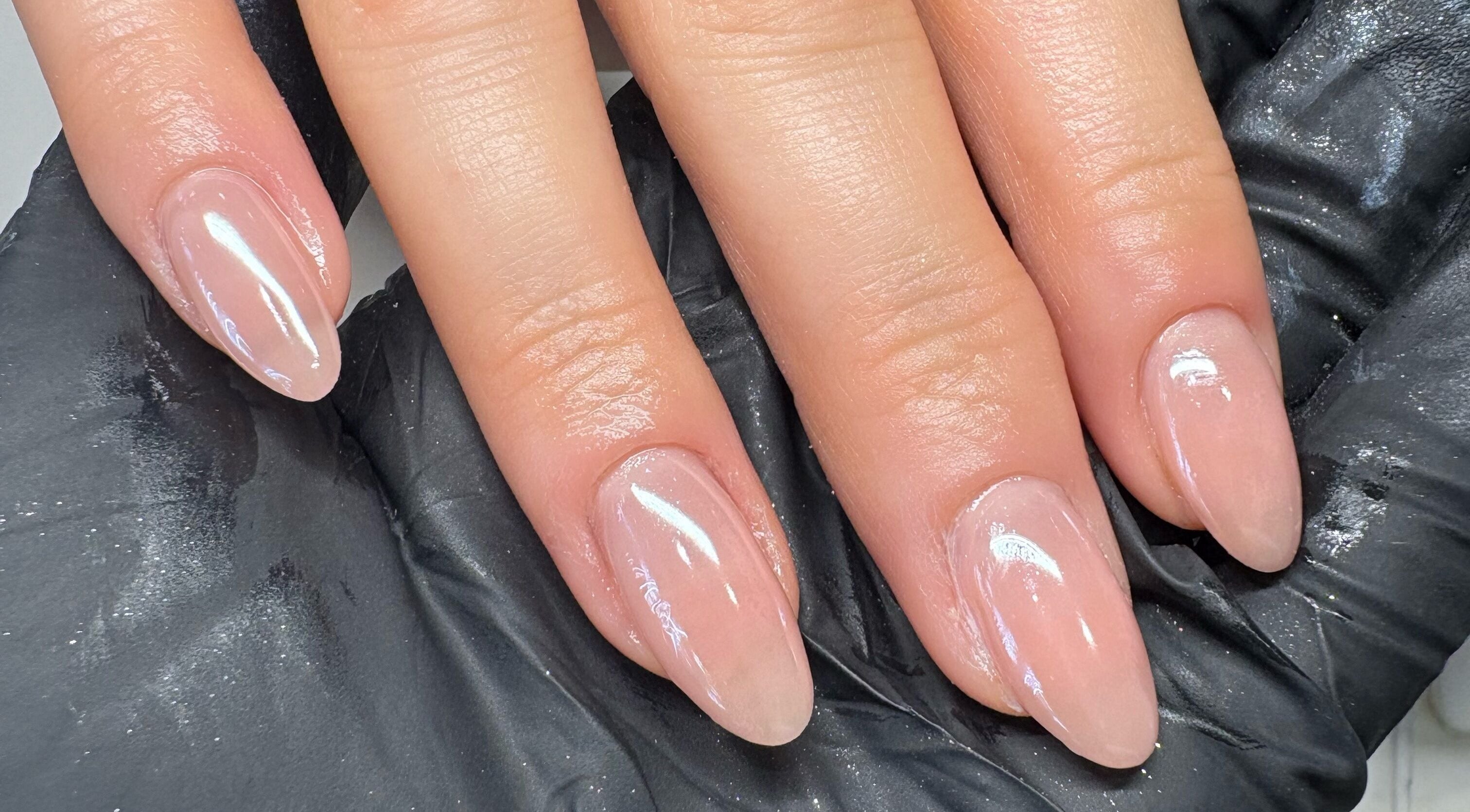 Elegant glossy nude nails at Elizabeth Zara Nails & Beauty, Sutton Coldfield, England, GB.