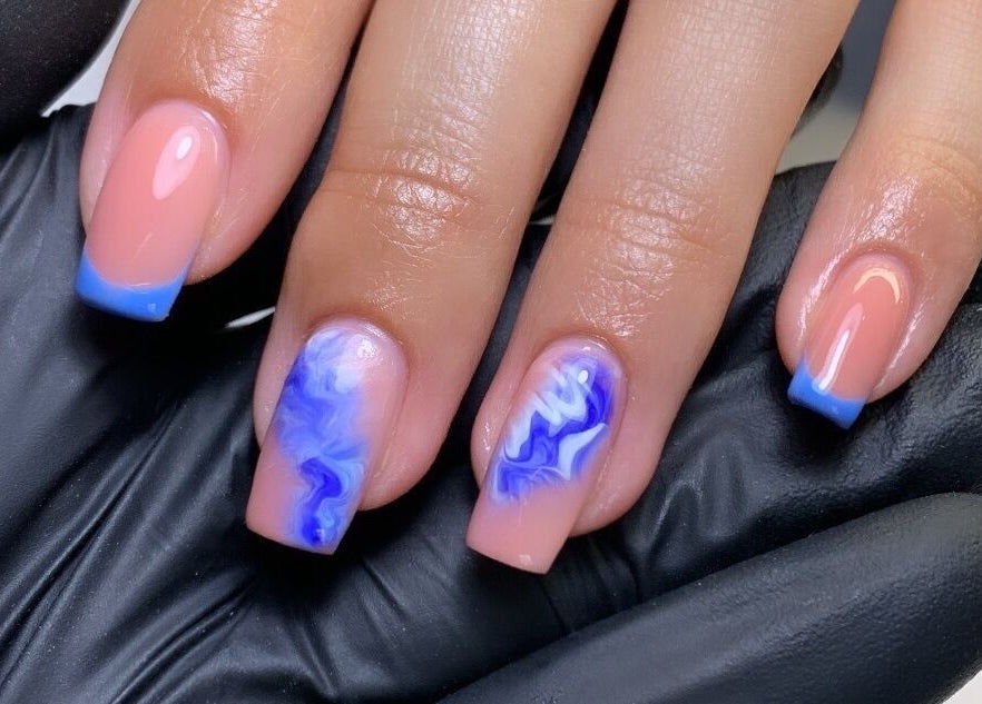 Elegant blue marble and French tip nails at Elizabeth Zara Nails & Beauty, Sutton Coldfield, England, GB.