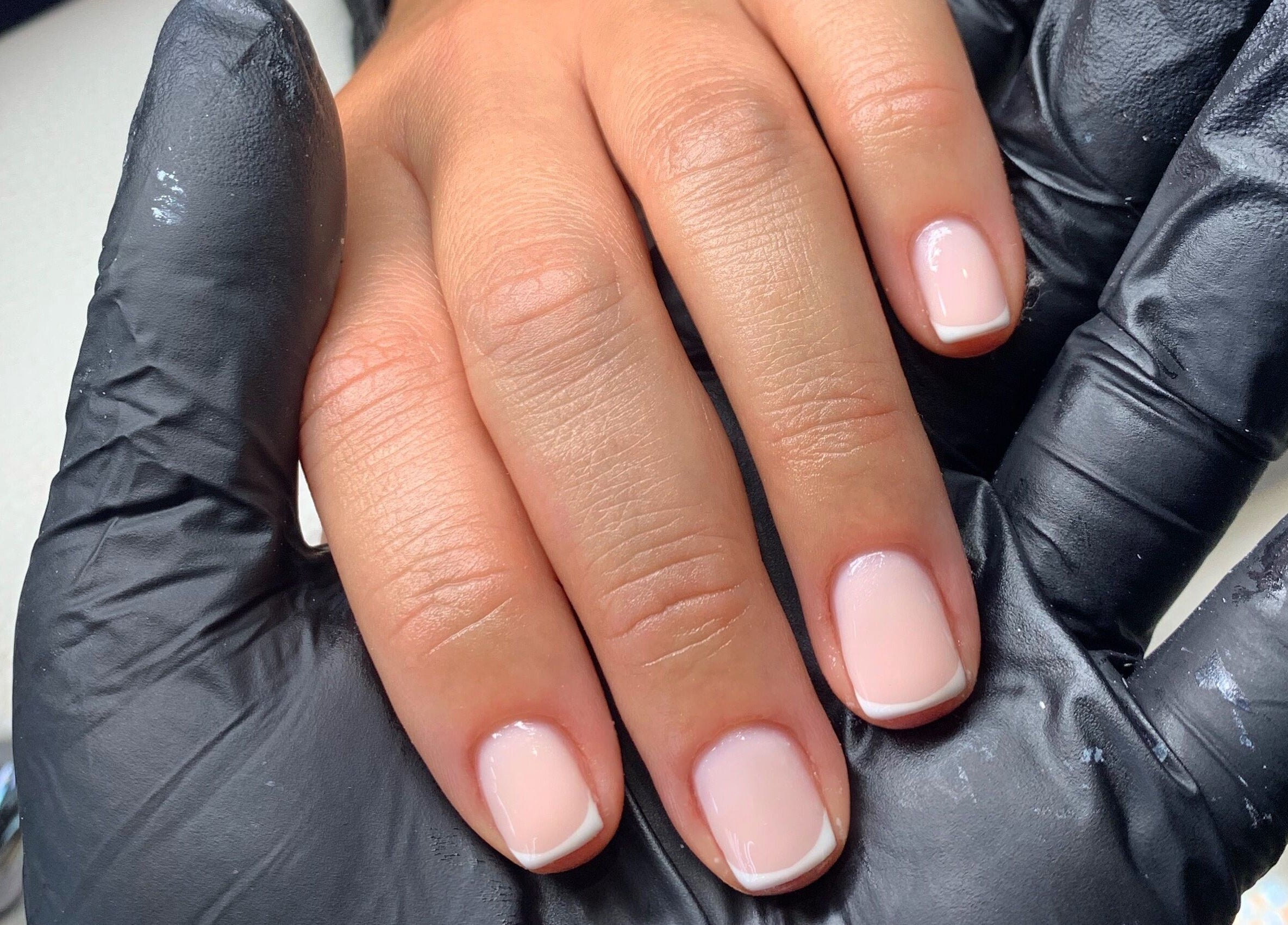Elegant French manicure at Elizabeth Zara Nails & Beauty, Sutton Coldfield, England, GB.