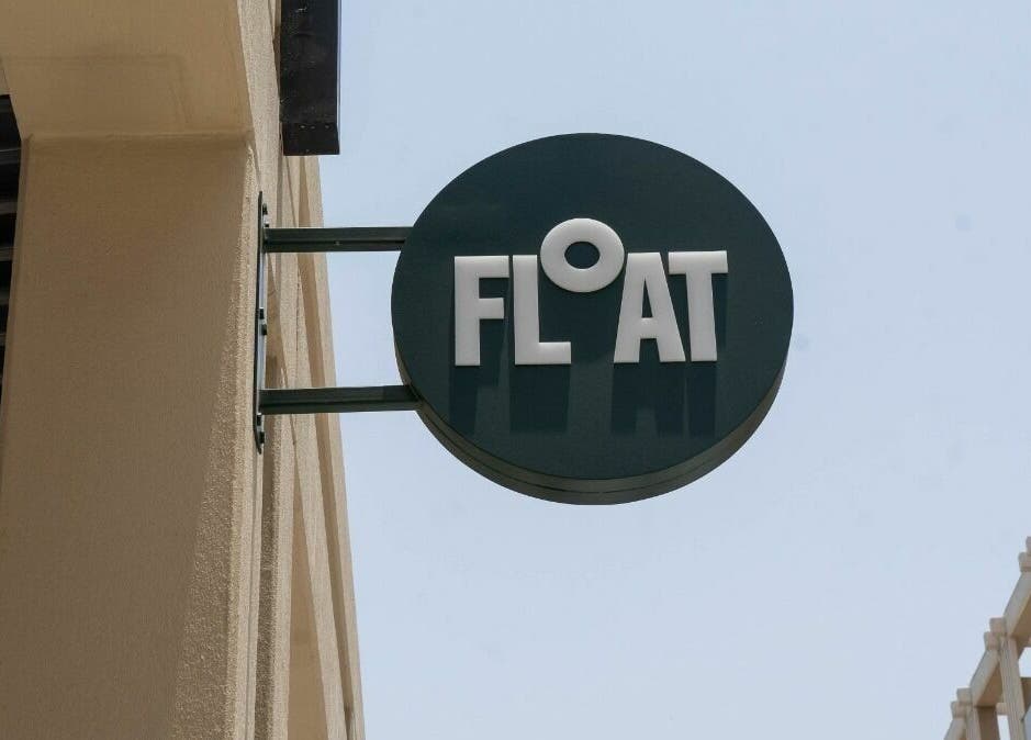 Float Barbershop exterior sign showing modern style in Sharjah, Sharjah, AE.