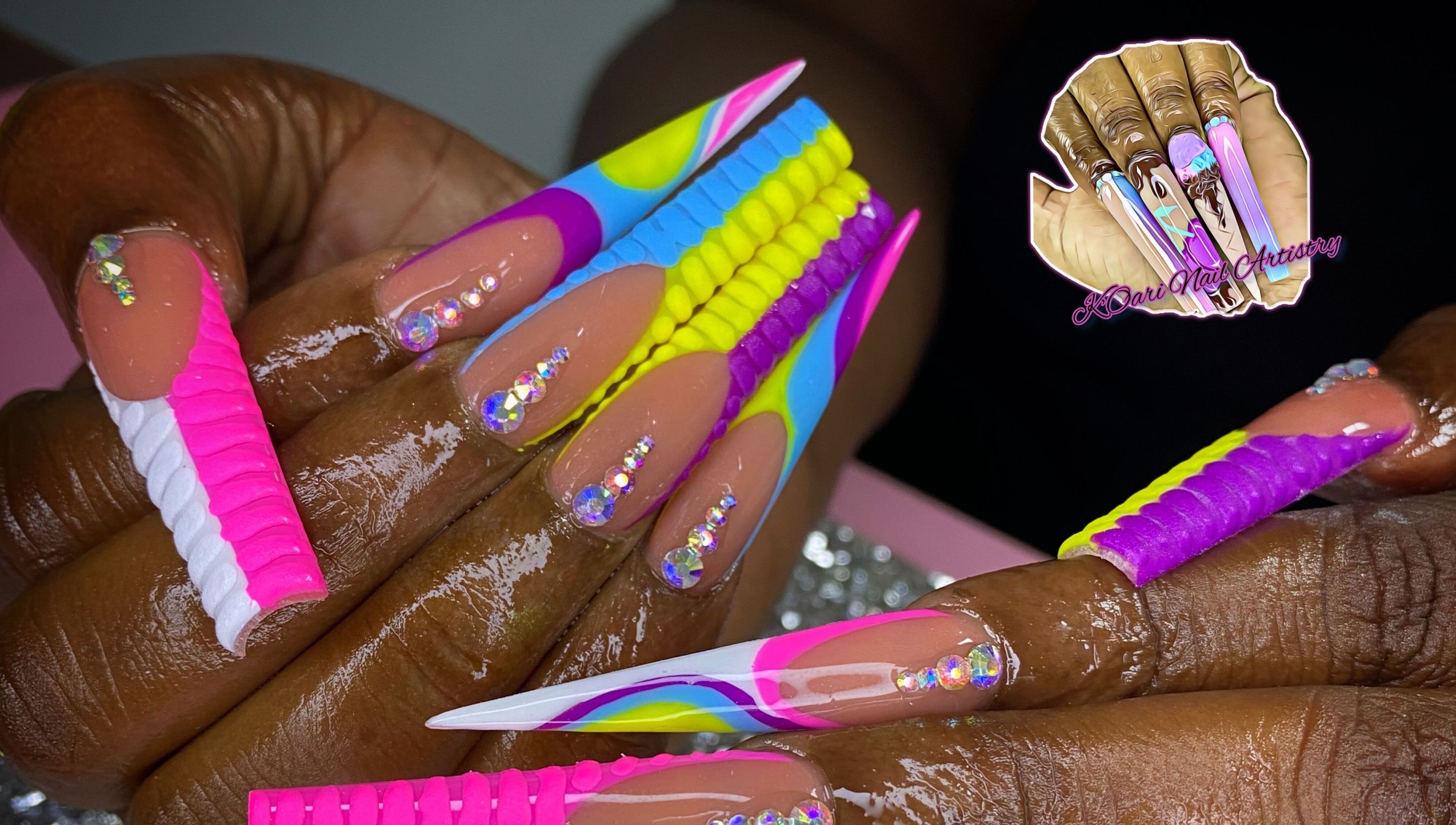 Colorful nail art with rhinestones at K’ Oari Nail Artistry, Potters Village, Saint John, AG.