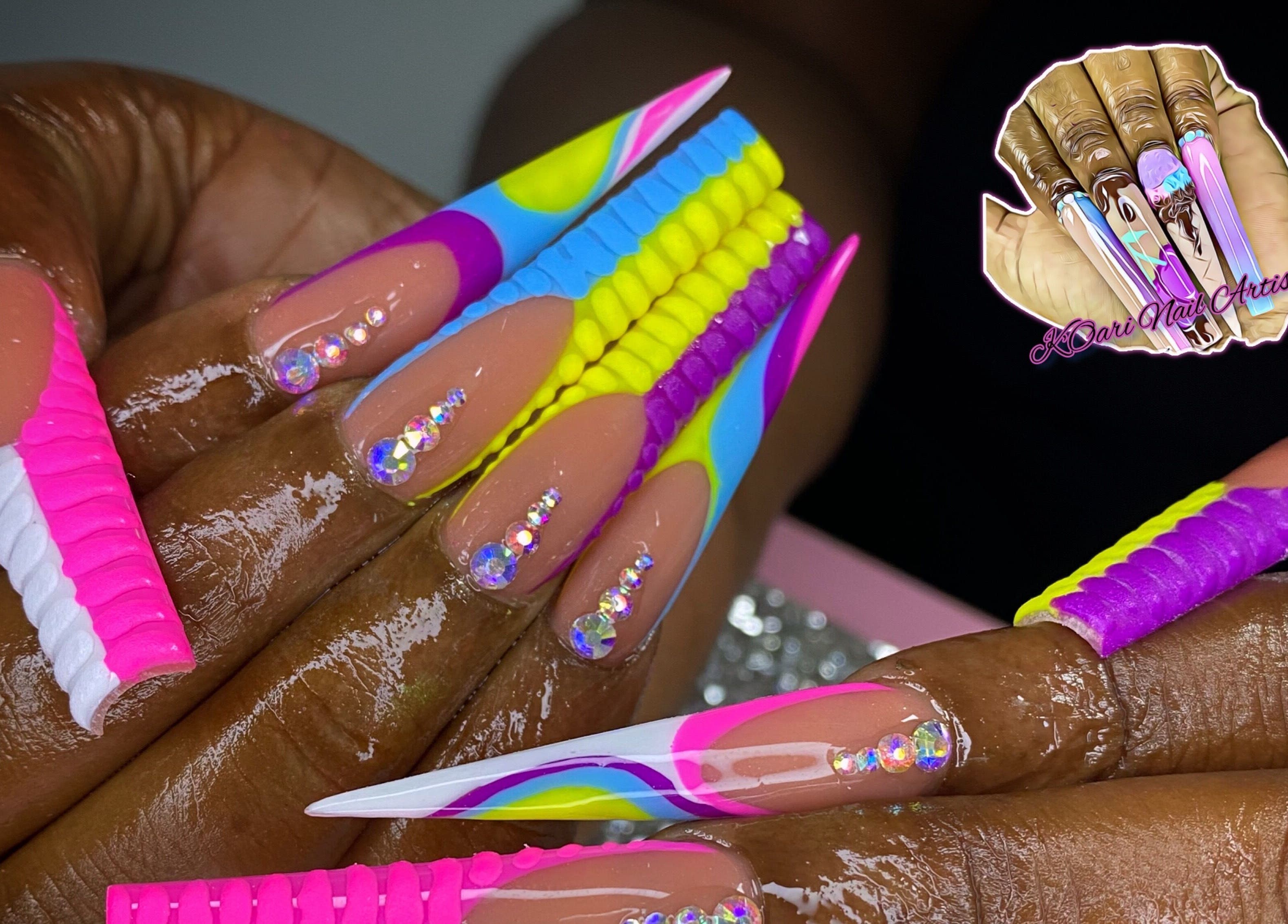 Colorful nail art with rhinestones at K’ Oari Nail Artistry, Potters Village, Saint John, AG.