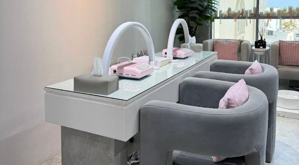 Modern beauty station at Azizam - Lashes & Brows, Dubai, AE, with plush seating and stylish decor.