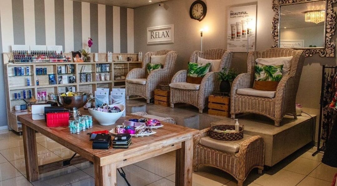 Relaxing seating area at Cindy’s Skincare at Tiffanys, Dolphin Coast, Kwazulu-natal, ZA with wicker chairs.
