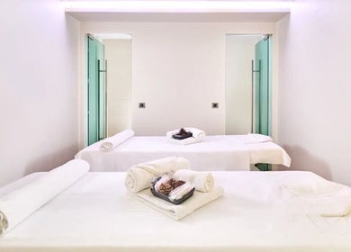 Elegant spa room at Wellness - Hotel Parentium, Poreč, Istarska Županija, HR with massage tables and soft towels.