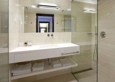 Modern bathroom in Wellness - Hotel Parentium, Poreč, Istarska Županija, HR with sleek design and amenities.