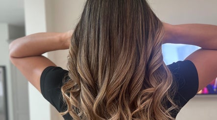Stylish curled hair by Hair by Suzie - Mobile Hairdresser in Cheshunt, Enfield, GB, expertly styled for elegance.
