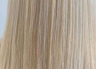 Silky smooth blonde hair styled by Hair by Suzie - Mobile Hairdresser in Cheshunt, Enfield, GB.