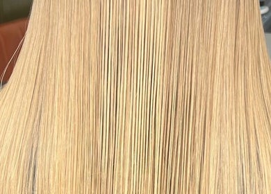 Smooth blonde hair styled by Hair by Suzie - Mobile Hairdresser in Cheshunt, Enfield, GB. Experience elegance.