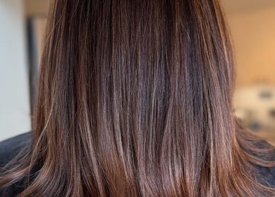 Elegant, silky brown hair styled by Hair by Suzie - Mobile Hairdresser in Cheshunt, Enfield, GB.